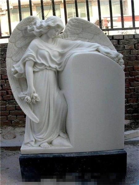 white marble carved tombstonep